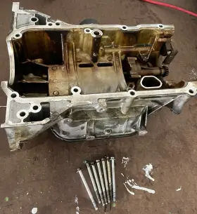 11110EM30B NISSAN Oil Pan Htbk Upper Versa